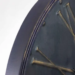 PENDULE METAL EMBOSSE D.77CM