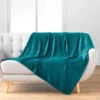 PLAID 125X150CM FLANELLE RELIEF UNIE NELIA BLEU