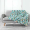 PLAID 125X150CM FLANELLE IMPRIMEE JUNGLE STORY
